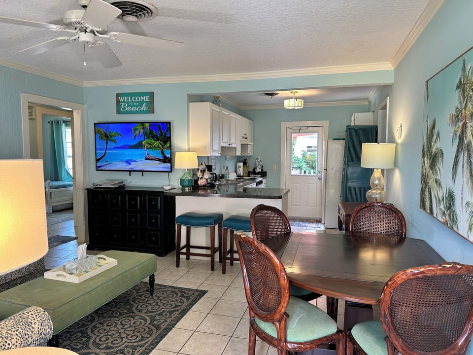 Warm and inviting open concept kitchen, dining and family spaces.