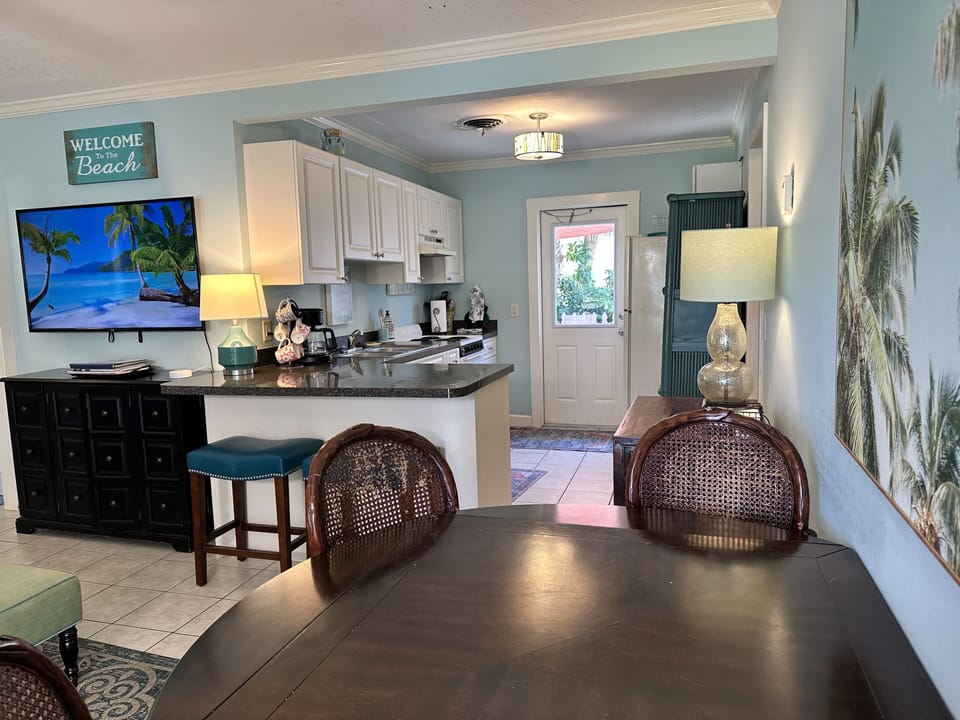 Dine indoors at the dining room table, or at the kitchen counter-height bar.