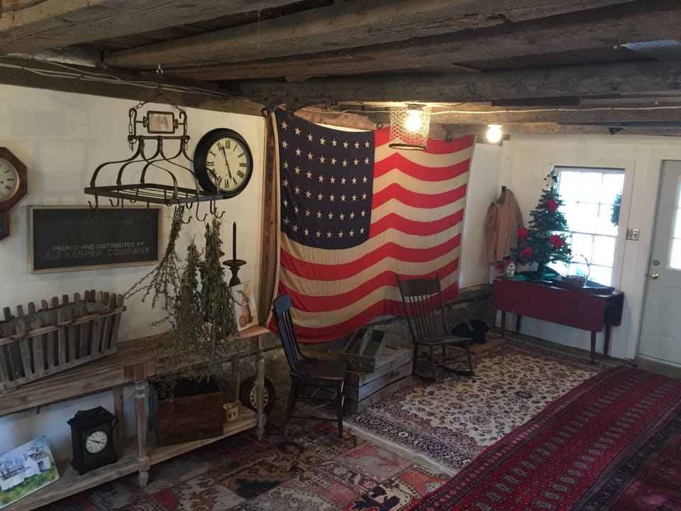 Side Entry Hall.  Beams in this room are old ship masts.