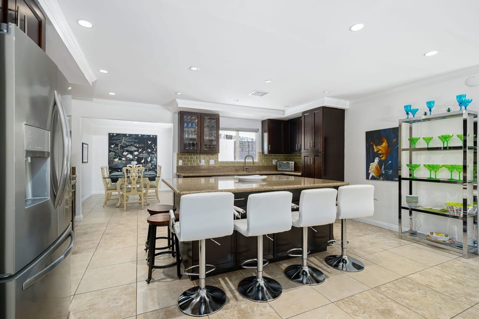 Kitchen, stainless steel, quartz countertops, wood cabinets