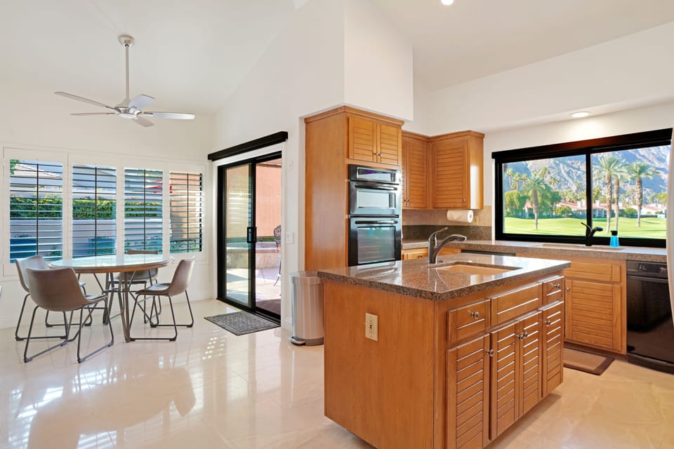 Kitchen island;   Kitchen Aid cooking appliances.  