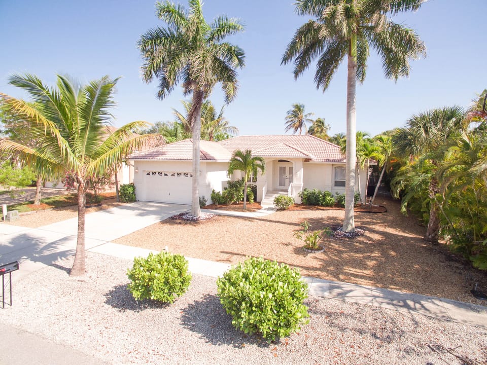 Front of home, located on quiet street, with full use of 2-car garage. 