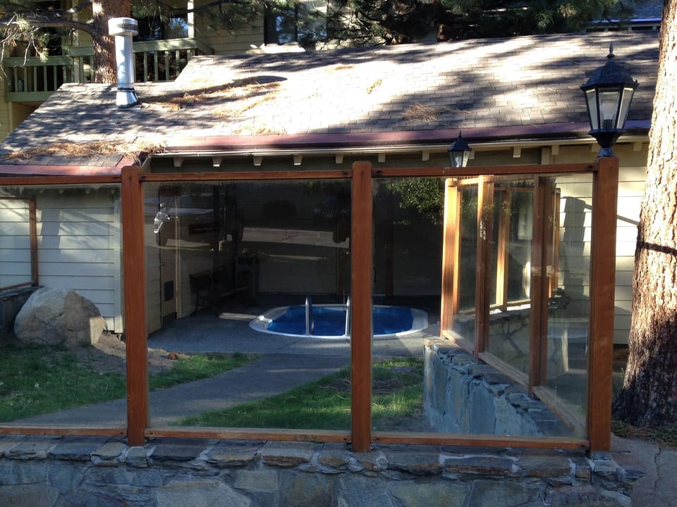 Covered Hot Tub steps from front door- Usable even while it's snowing!