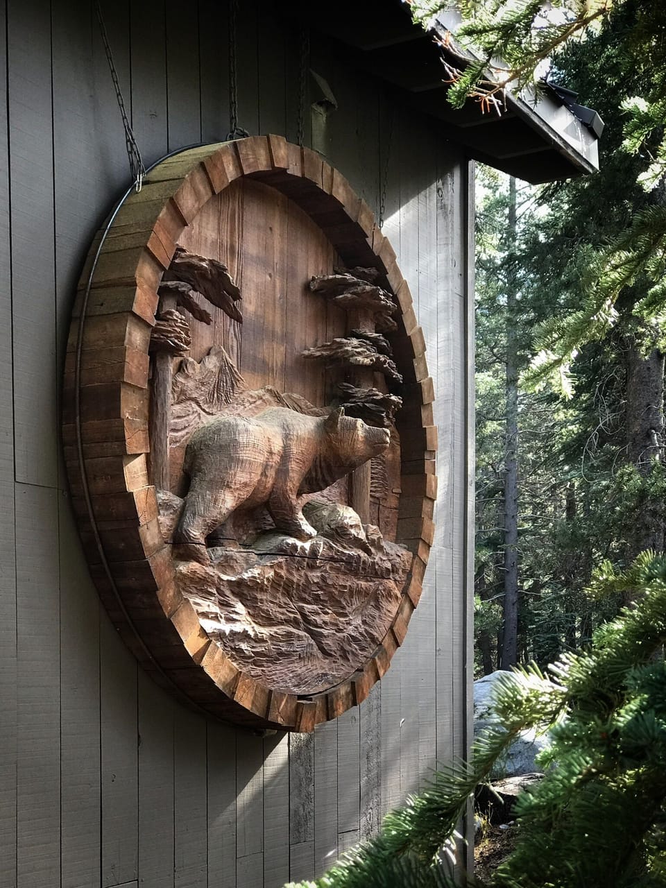 The giant bear medallion was carved by a local artist from a wine barrel
