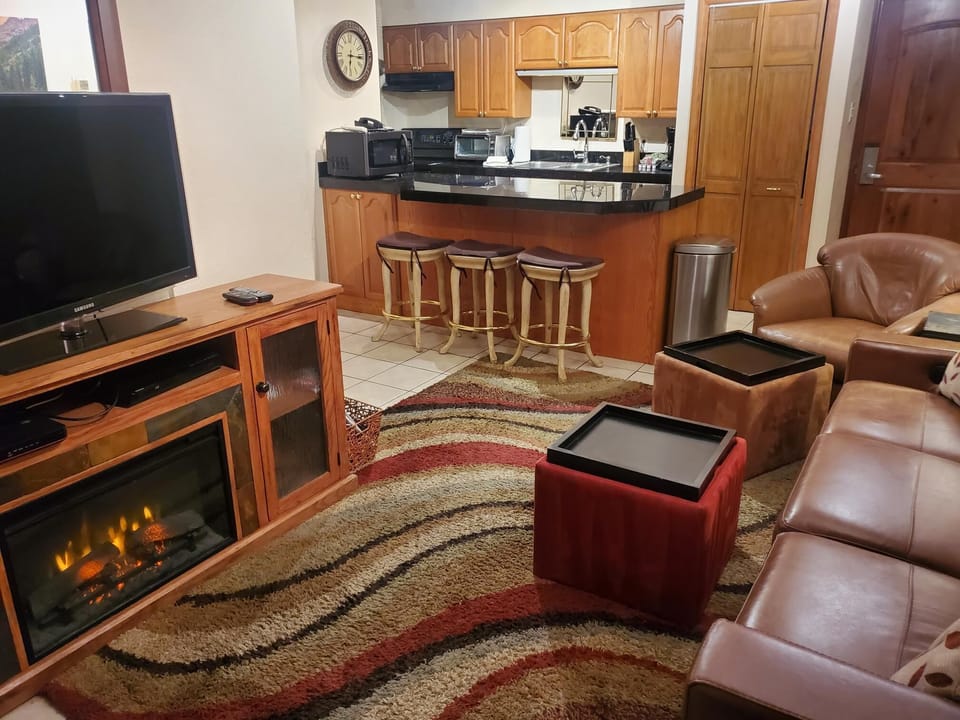 Cozy fireplace (electric) blows warm air and can be controlled from the sofa!
