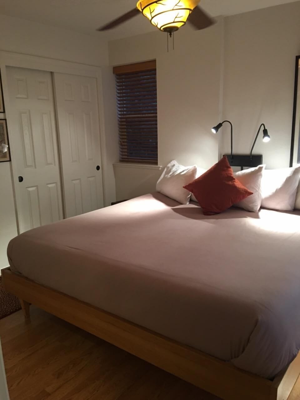 The master bedroom features a king sized bed and private bathroom.