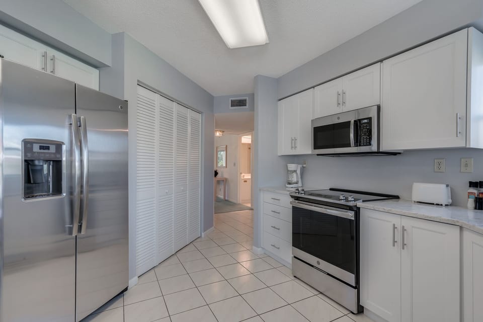 Fully Equipped Kitchen with Stainless Steel Appliances