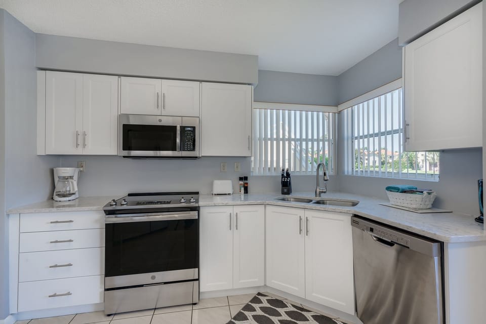 Fully Equipped Kitchen with Stainless Steel Appliances