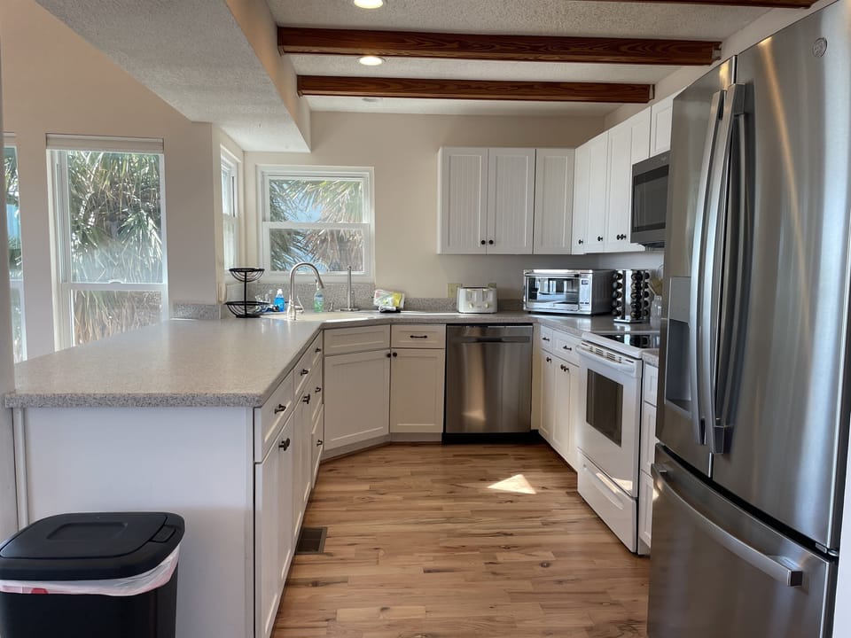 Large, fully equipped kitchen.  Plenty of cookware, dishes and glasses.