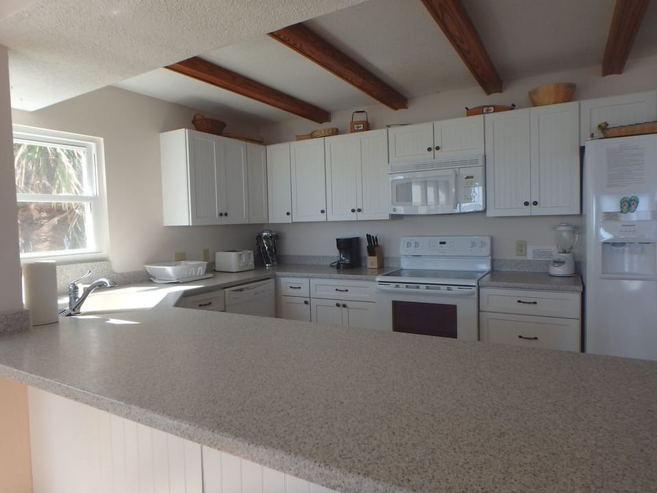 Large, fully equipped kitchen.  Plenty of cookware, dishes and glasses.  