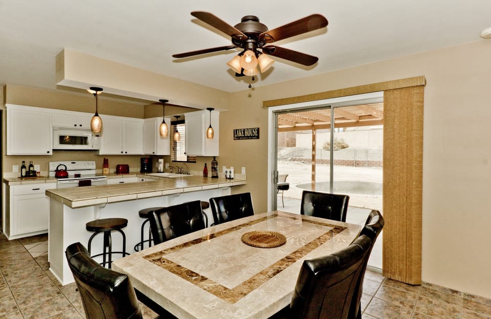Dining Area with Slider to backyard, pool & spa.