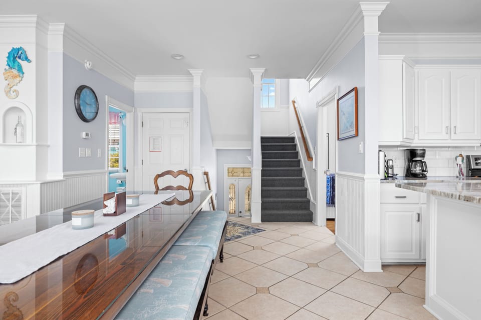 kitchen level -stairs leading to top floor
