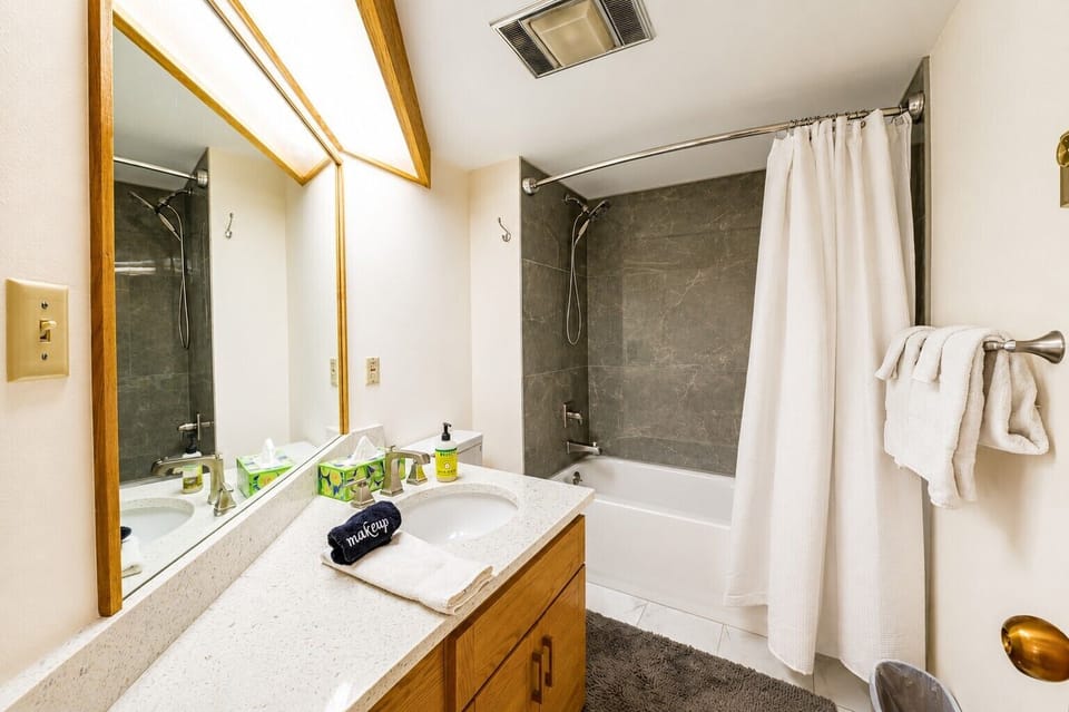 Full bathroom with a tub and shower - convenient for families and groups