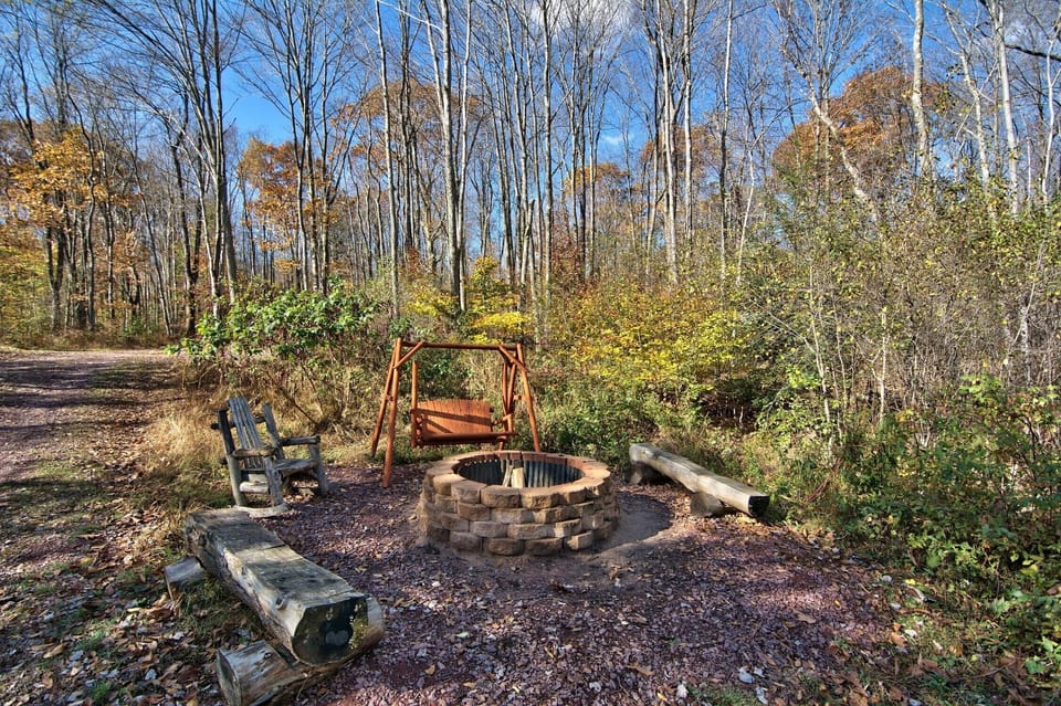 Check Out The Fire Pit Located Towards The Entrance Of The Home. 