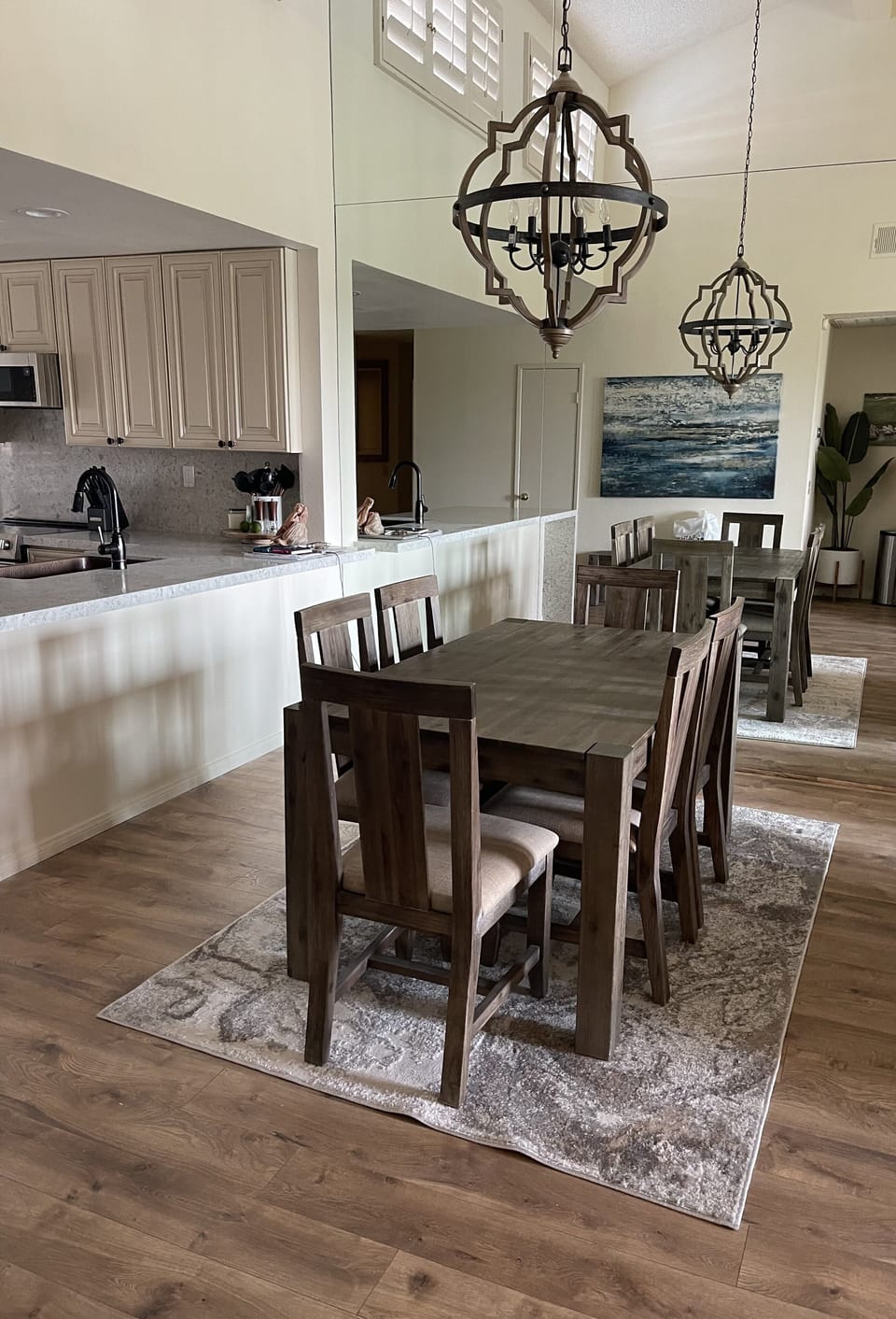 Dining area seats 6 & 4 barstools at counter 