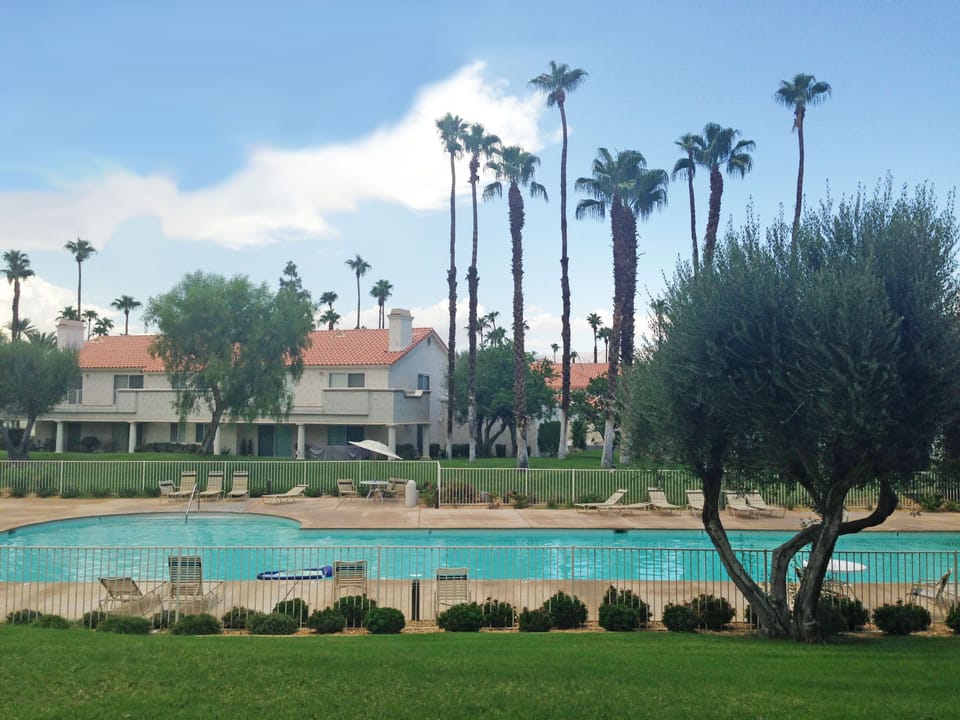 Largest pool in Desert Falls-20 yards from ground level patio and living room.