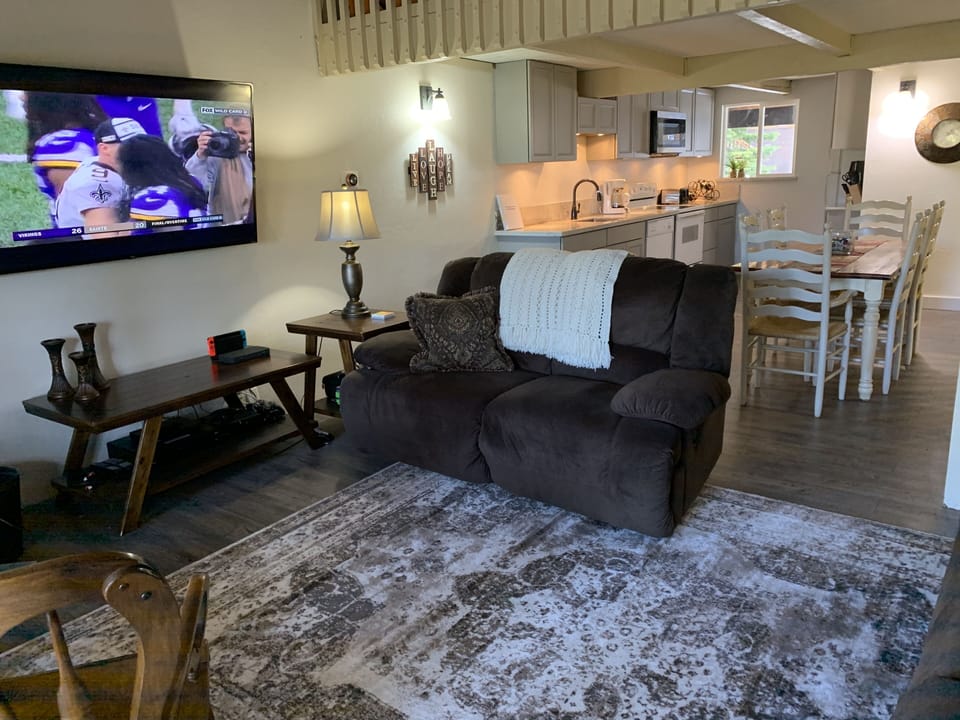 Living Room to Kitchen with 65" Smart TV