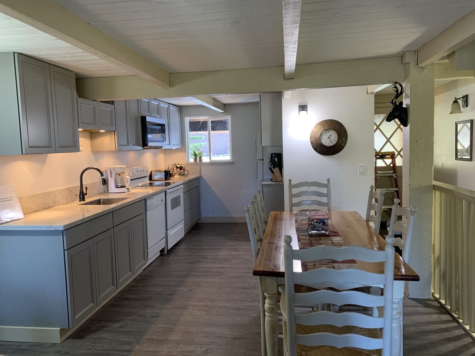 Remodeled kitchen with granite countertops and high end fixtures.