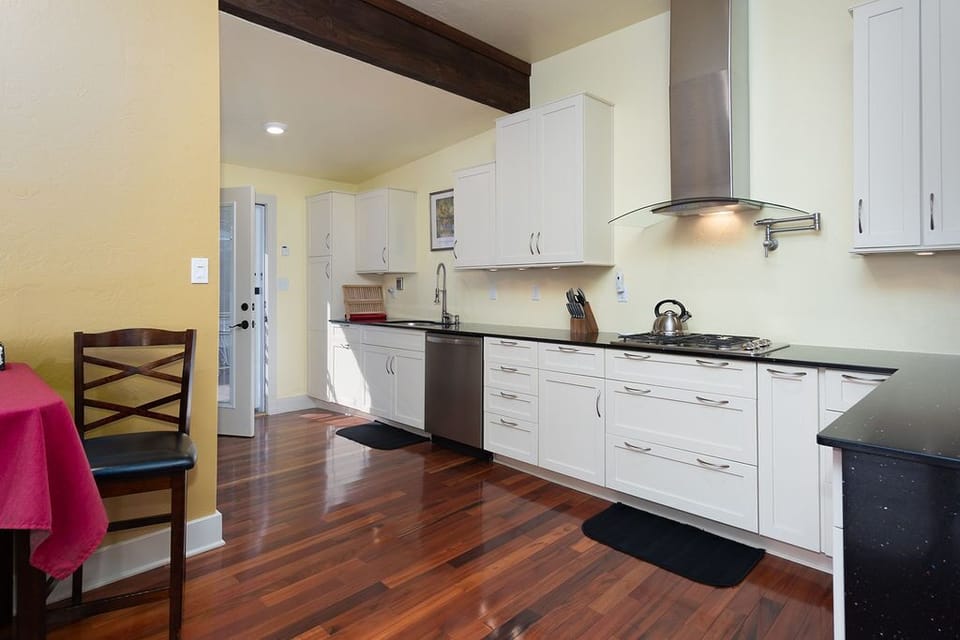 The kitchen has all the appliances, dishes, and cookware that you'll need.