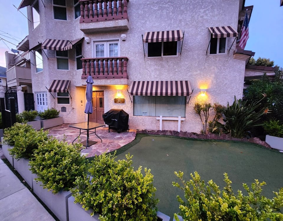 One of the very rare houses in Avalon that actually has a front yard.
