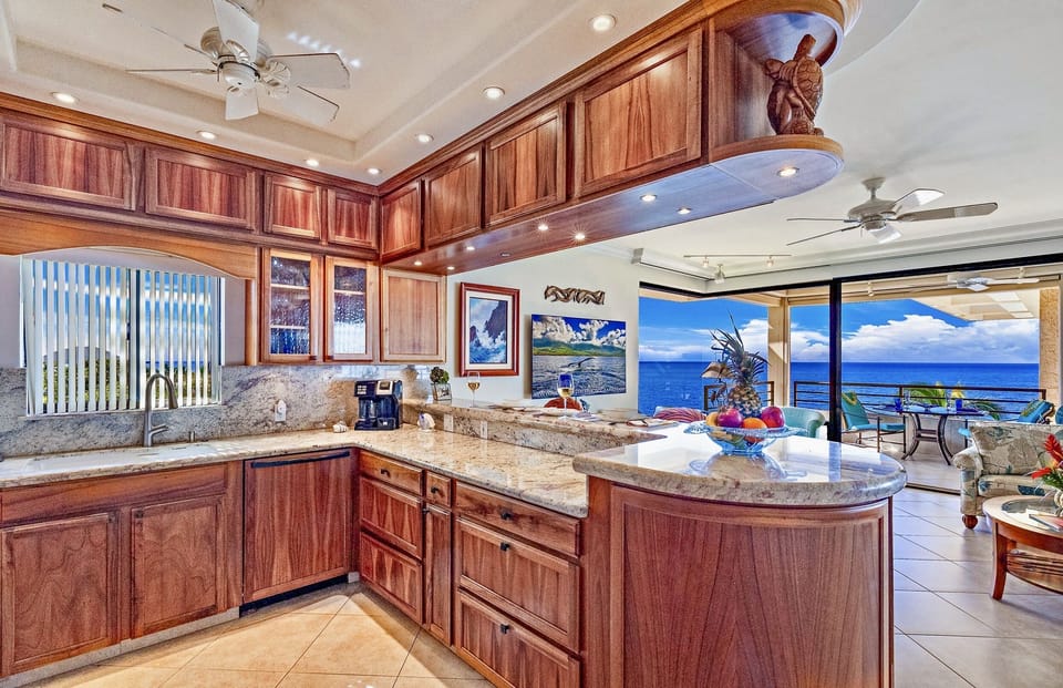 Enlarged no-fuss full kitchen .Well equipped for easy meal prep with great views
