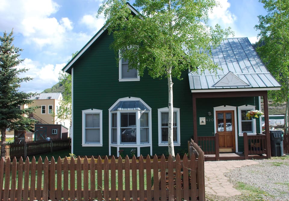 Front of Cabin with fenced yard.