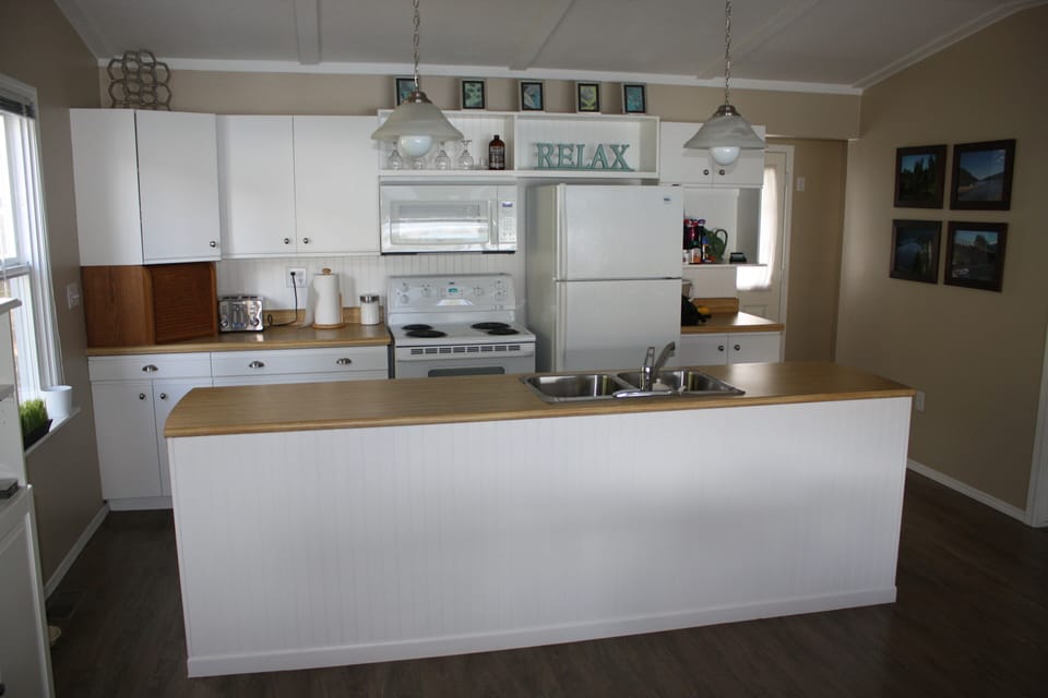 Kitchen - Island looks out to the Lake & Beach.