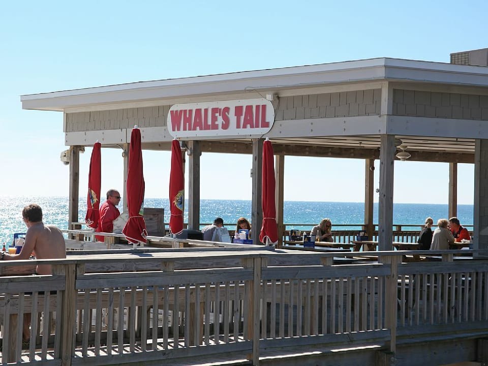 Catch a bite to eat or the sunset and a drink