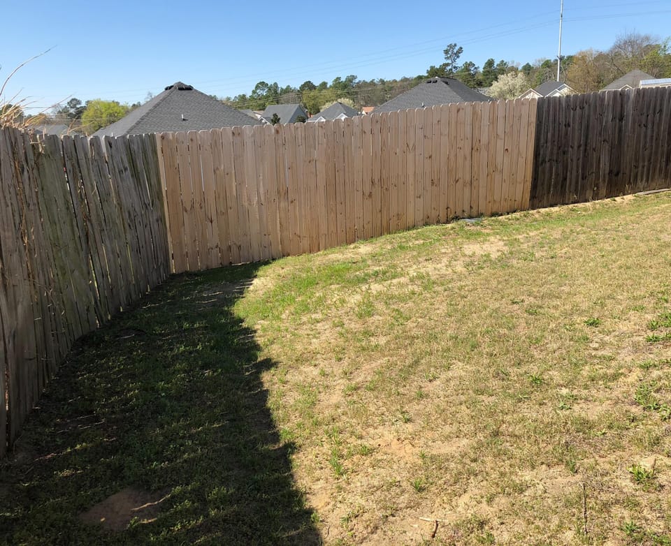 Fenced in backyard (grill and outdoor table not shown but included)