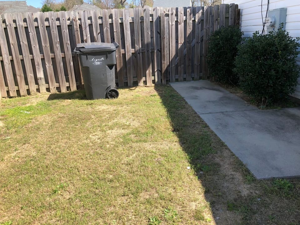 Fenced in backyard (grill and outdoor table not shown but included)