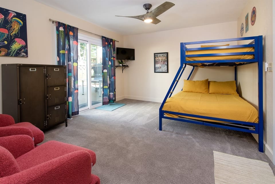 The third bedroom has a twin over full bunk plus TV