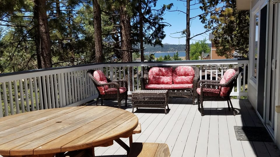A large deck to lounge and enjoy the lake while you BBQ.