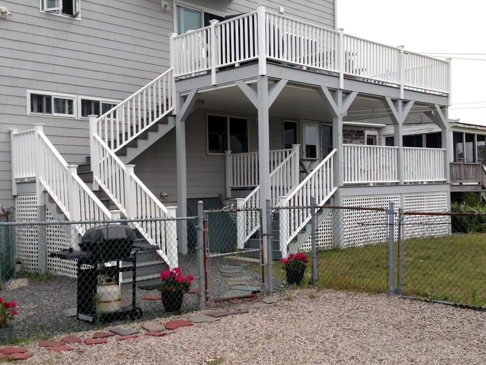 Back yard area and parking for two cars
