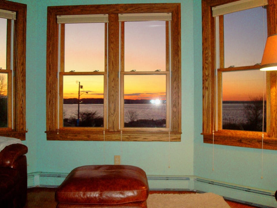 Master bedroom sitting area at sunset.