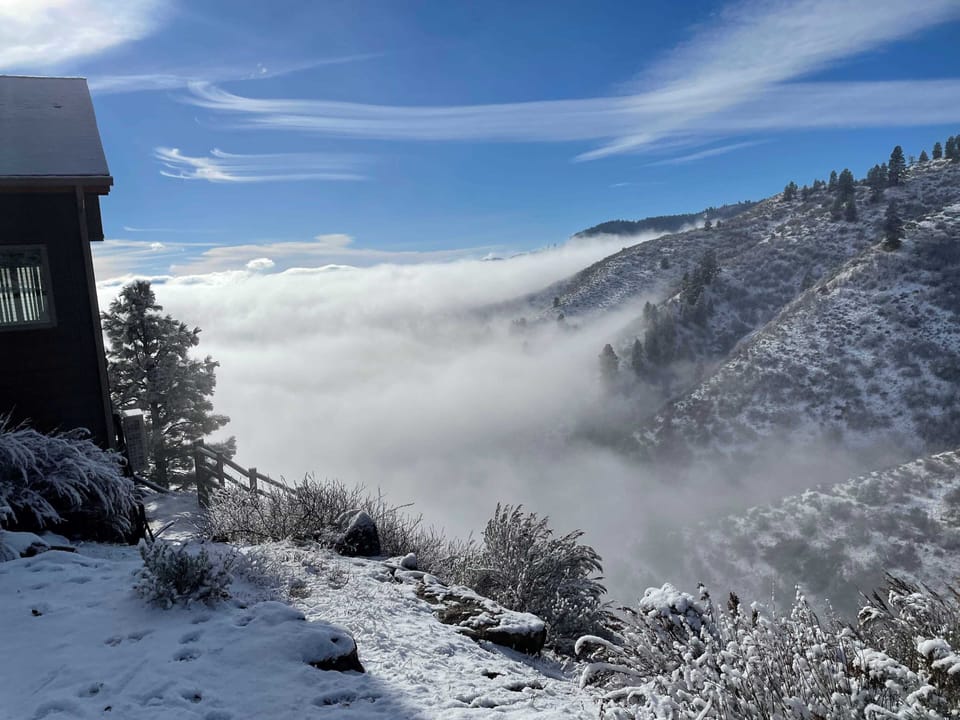Above the clouds on an early winter morning