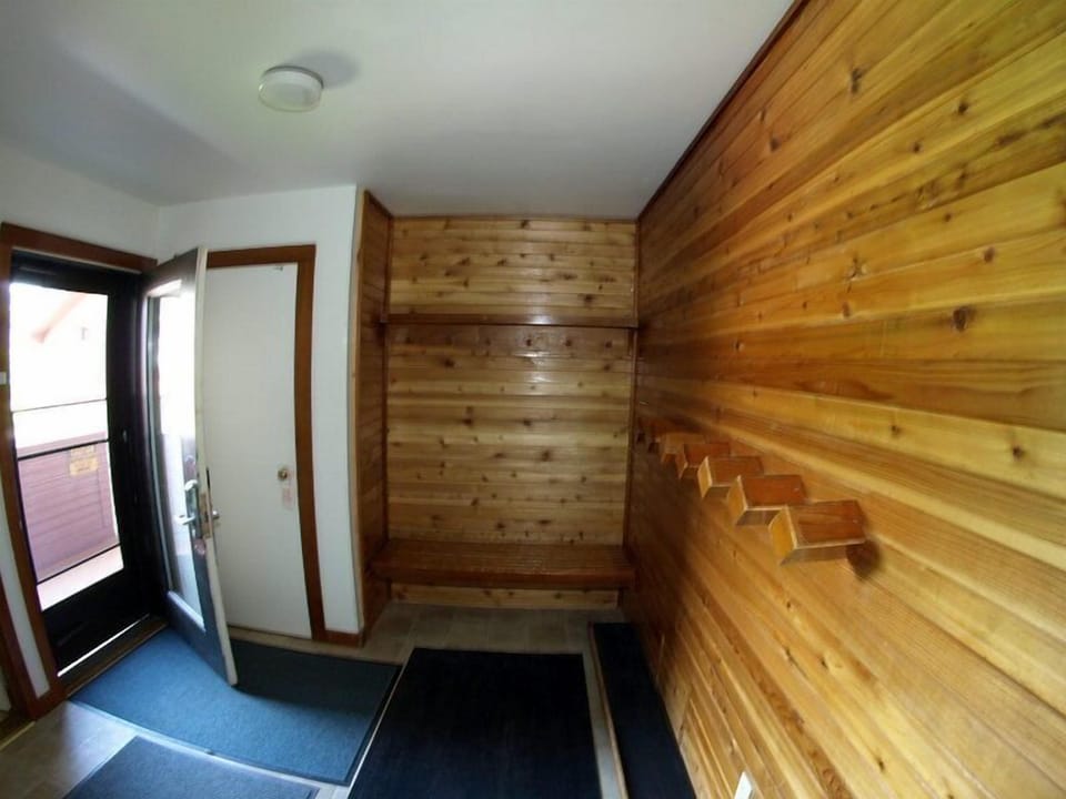 large entry with closet and plenty of room for skis and clothing/boots