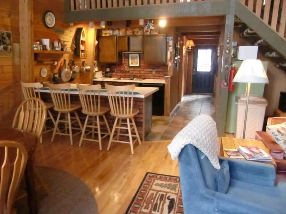 ACROSS BREAKFAST BAR TO KITCHEN