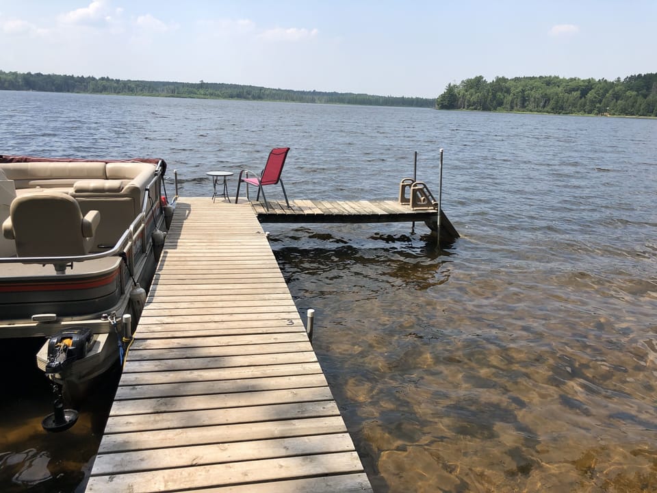 Pier and steps into the swimming area.  Sandy bottom for swimming