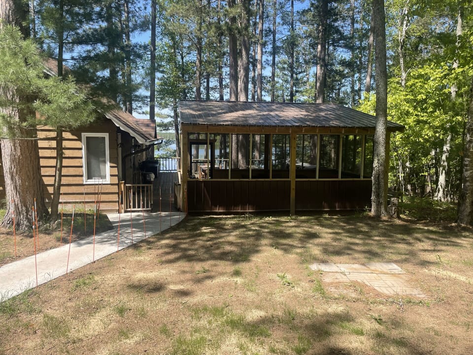 new screen room from driveway.  new concrete from driveway to house w/no steps. 