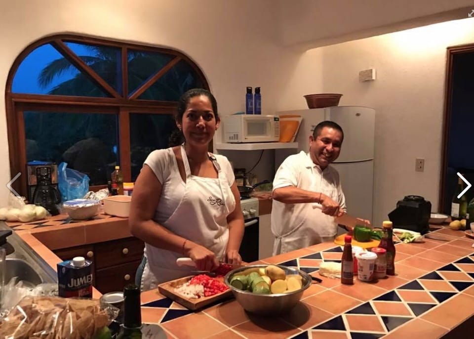 Yeyo and Frances preparing dinner (for a fee) at Casa Melissa