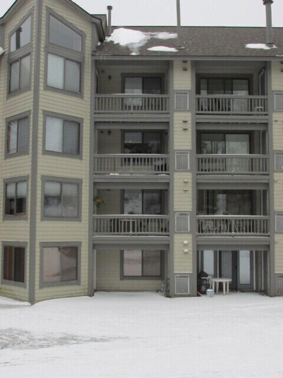 Our condo is truly slopeside.  Ours is the one with the hanging plant & table