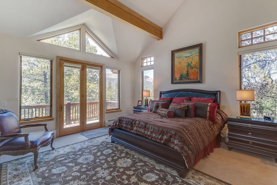 Upstairs Master with King Bed, fireplace and views of the mountains