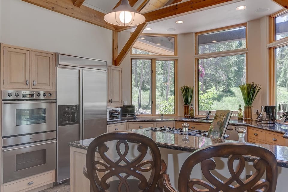 Kitchen all windows all granite and stainless steel appliances