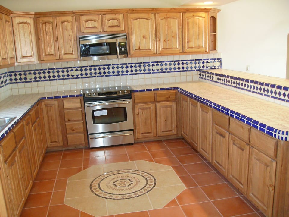 Kitchen is fully stocked with Pots, pans, utensils, plates, cups etc.