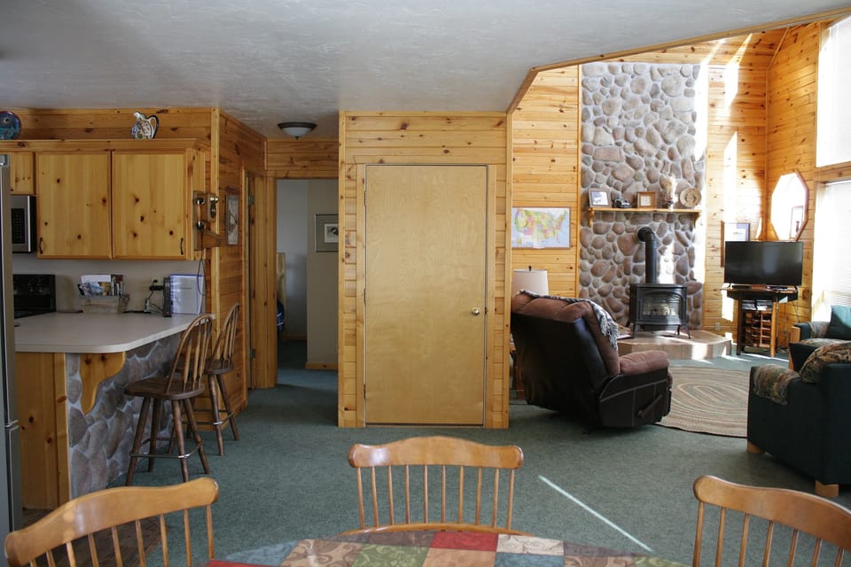 main floor: Great room, breakfast bar, dining area wit room for 8 at table