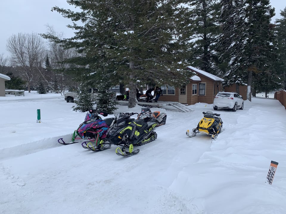 Snowmobile trailer parking with turn around.