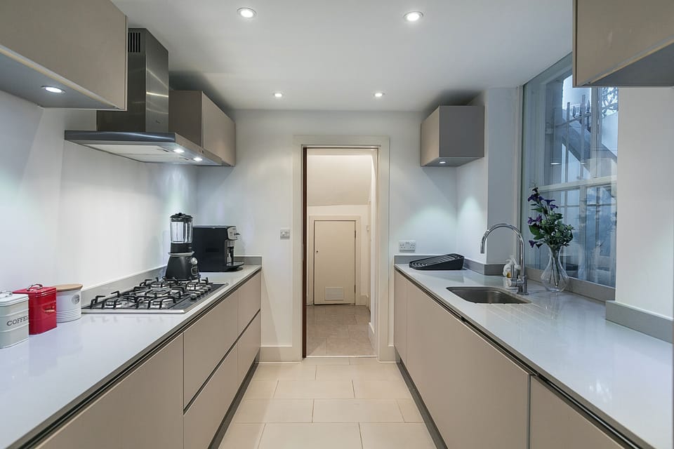 Kitchen leading to laundry room