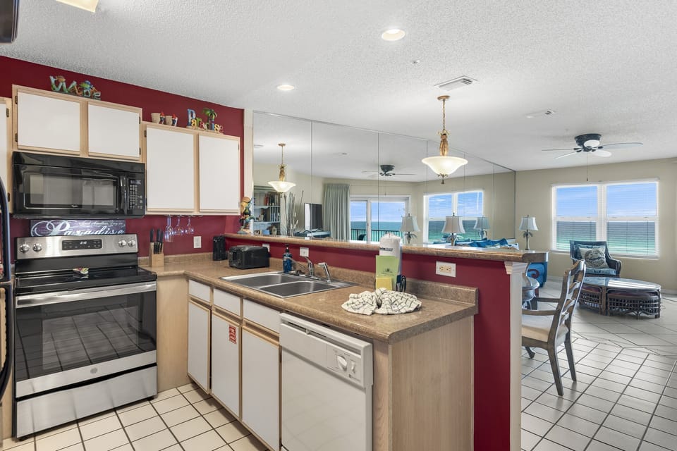 Prep meals with sweeping water views from the kitchen.