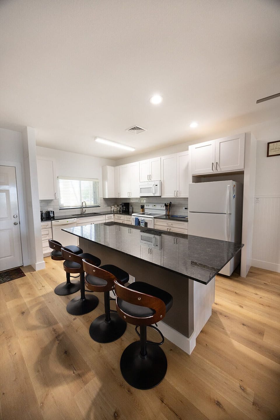 Large island bar counter in kitchen 