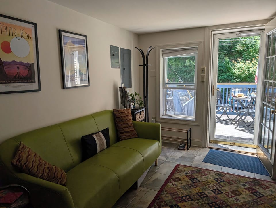 The living area opens onto the rear deck on Race St. This is the guest entrance.